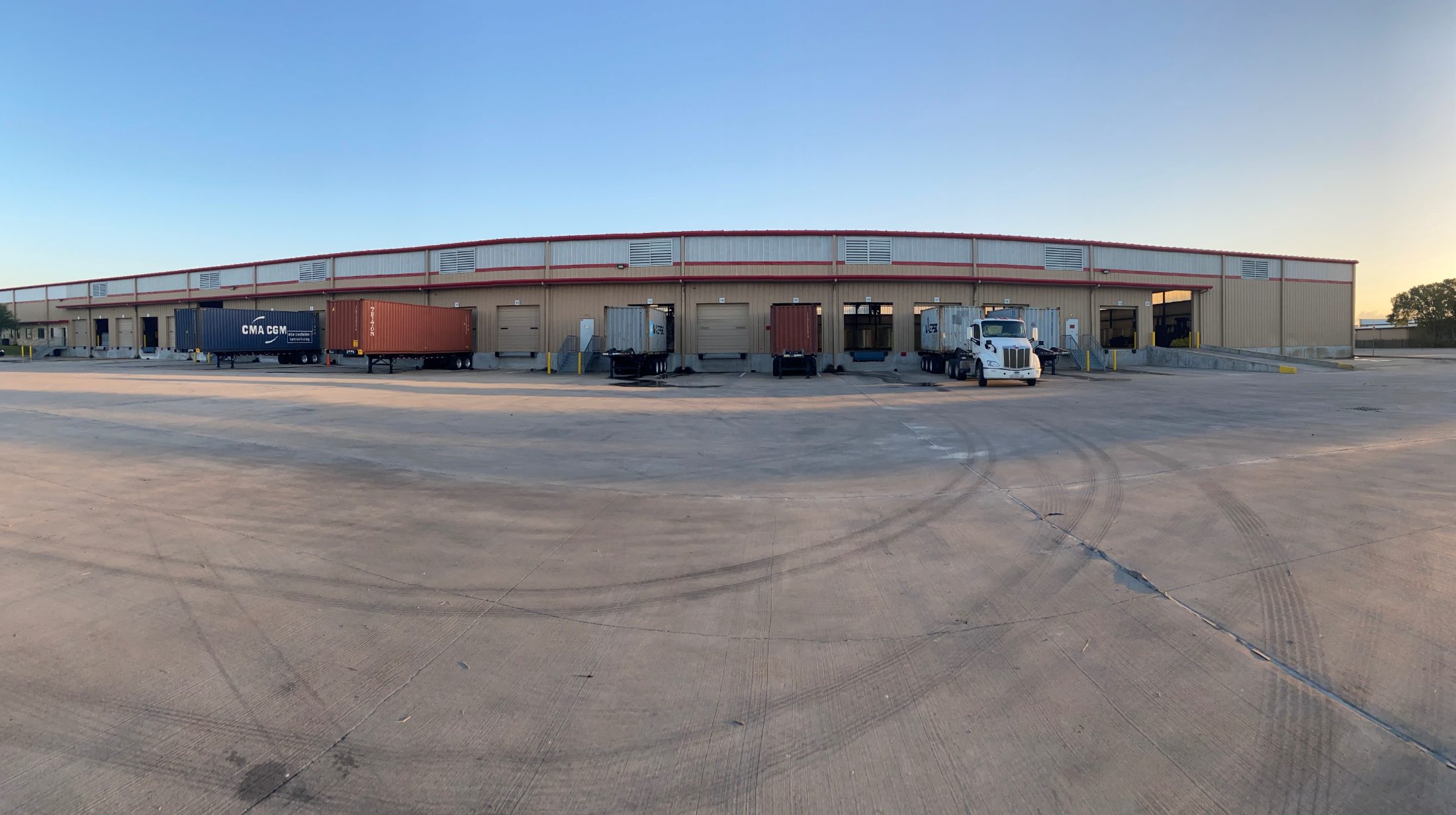 Dock face and container yard at the Dockside Logistics Houston, Texas facility at first light