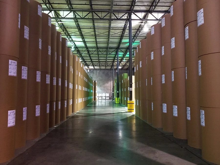 Imported paper rolls stored in aisles at the Saint George facility serving the Savannah market